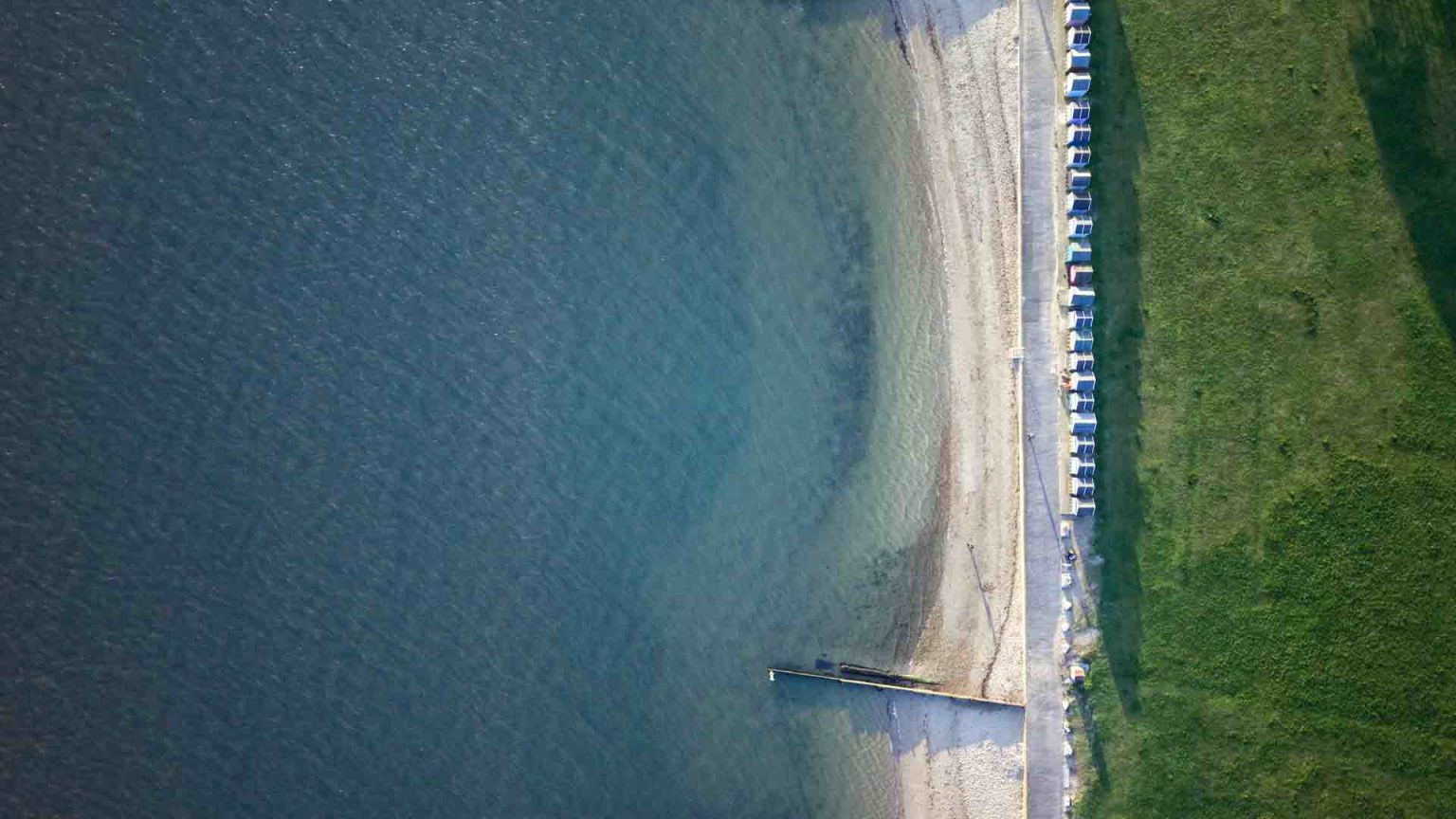 birds-eye view of Hamworthy Park poole, beach huts and field drone services Dorset Hampshire