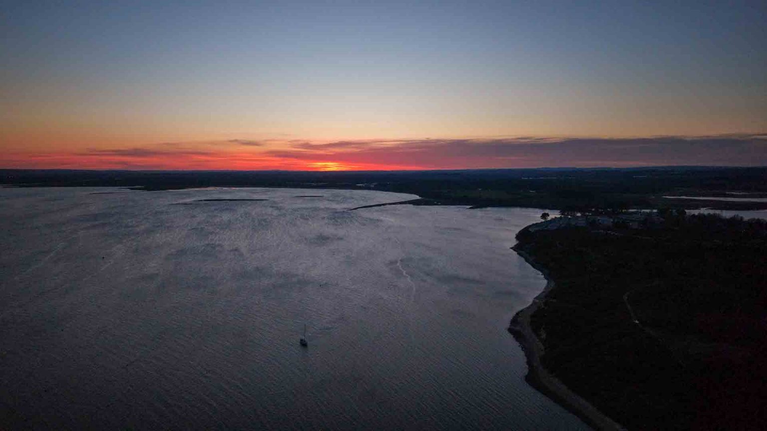 Hamworthy Lake Lier Poole sunset medium drone shot drone services Dorset Hampshire
